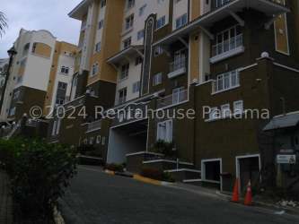 Light-filled living and dining room with large windows and canal view in Forest Towers apartment Panama Pacifico