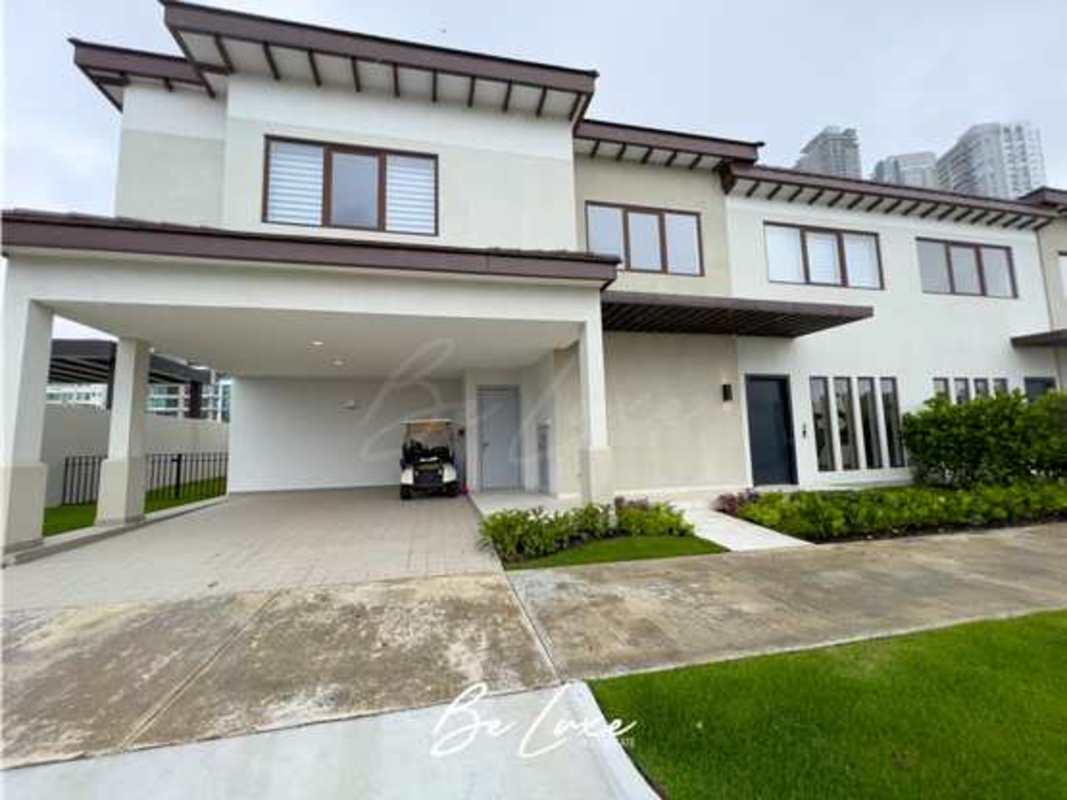 Spacious kitchen with light wood cabinets and stainless appliances The Woods Santa Maria Panama