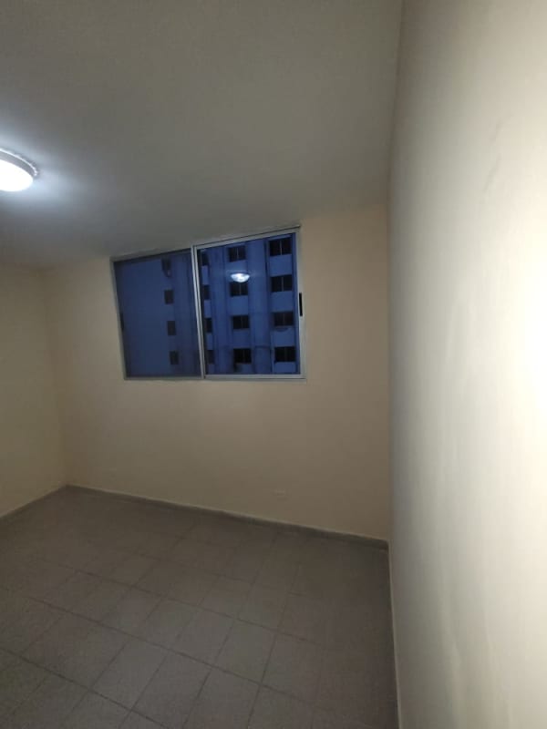 Bedroom window overlooking neighborhood cityscape in PH Morada del Sol Panama