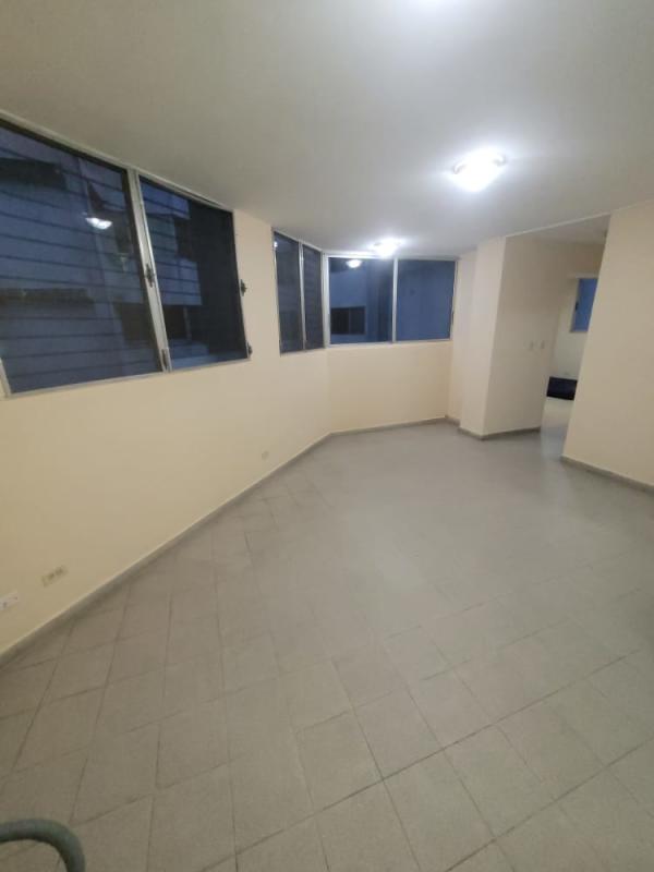 Laundry area with sink and storage beside kitchen space in PH Morada del Sol 12 de Octubre Panama City