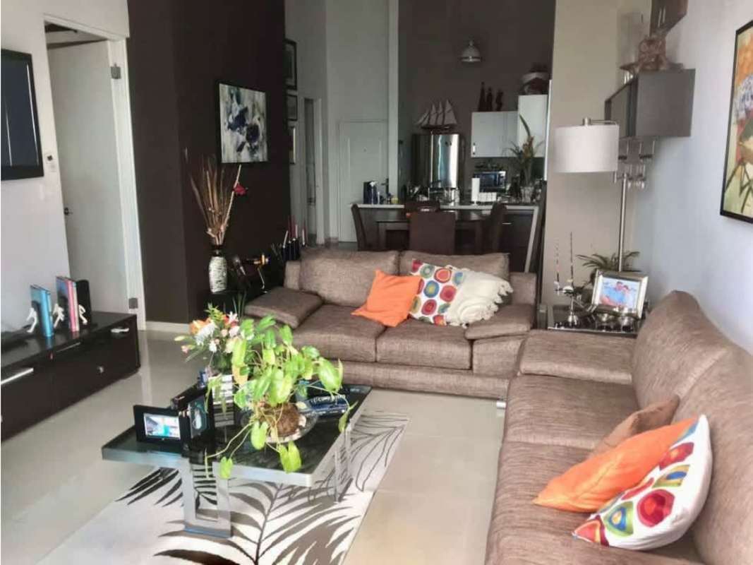 Spacious bedroom with large window and ocean views, neutral decor PH Coco Place Coco del Mar Panama