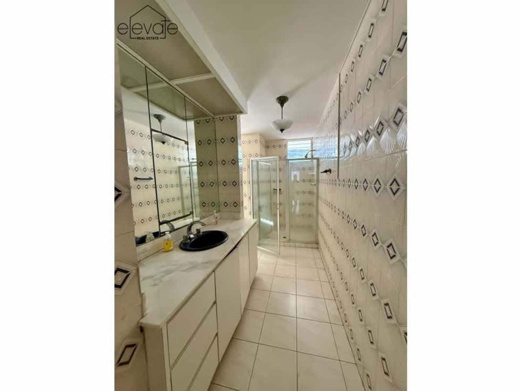 Spacious modern master bedroom with marble flooring and ocean views in PH Tamanaco Punta Paitilla Panama