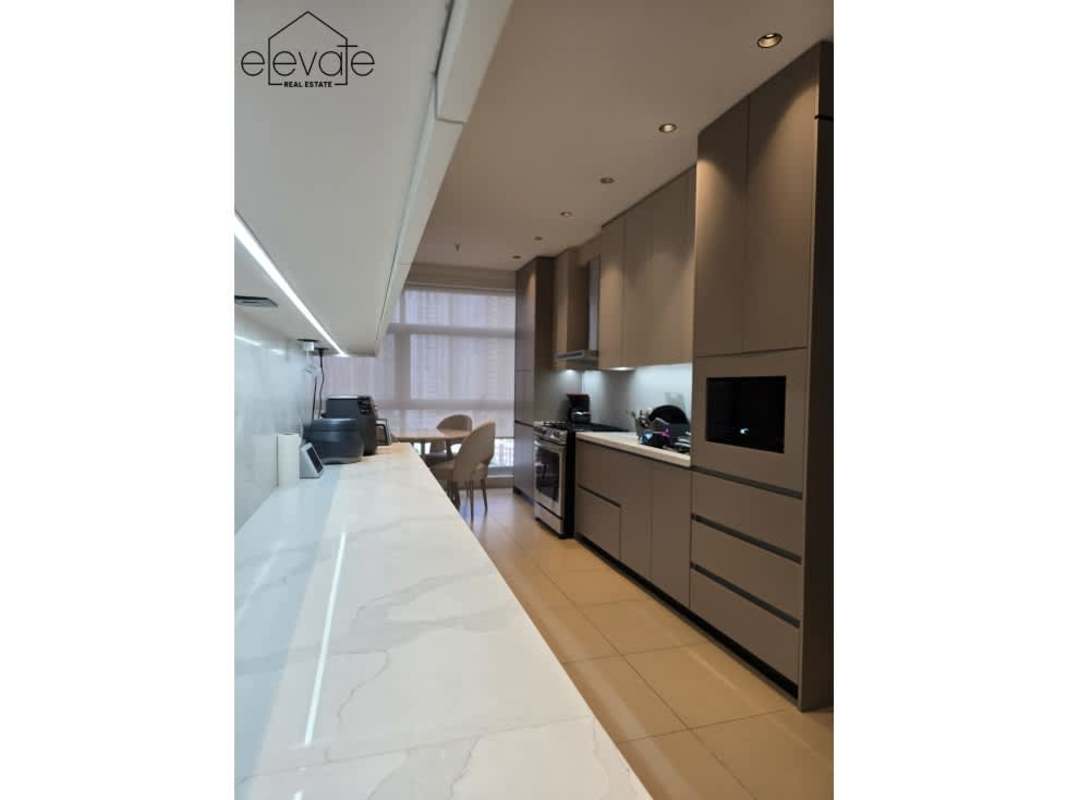 Marble bathroom with soaking tub and modern fixtures PH Q Tower Punta Pacifica Panama