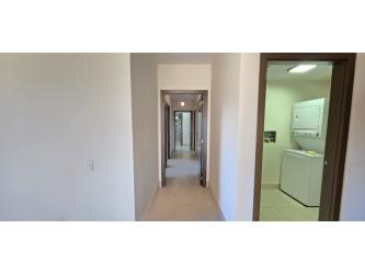 Spacious master bedroom with large window and walk-in closet River Valley Panama Pacifico