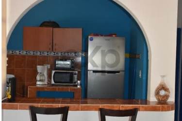 Functional bathroom with nautical motif shower curtain at Playa Malibu beach house
