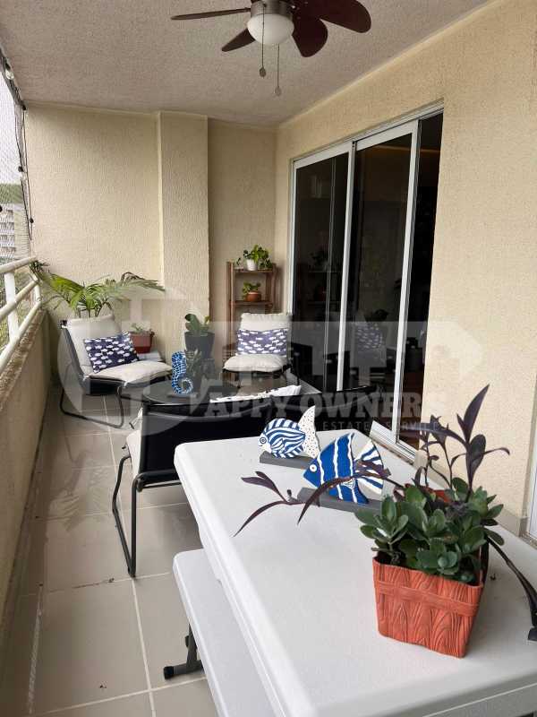 Large balcony with seating and ceiling fan Altamira Gardens Ancón Panama City