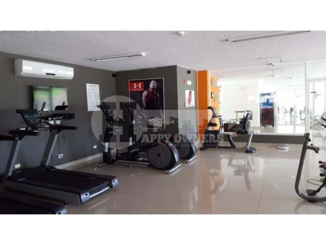 Open plan living dining with large windows at Altamira Gardens Panama City