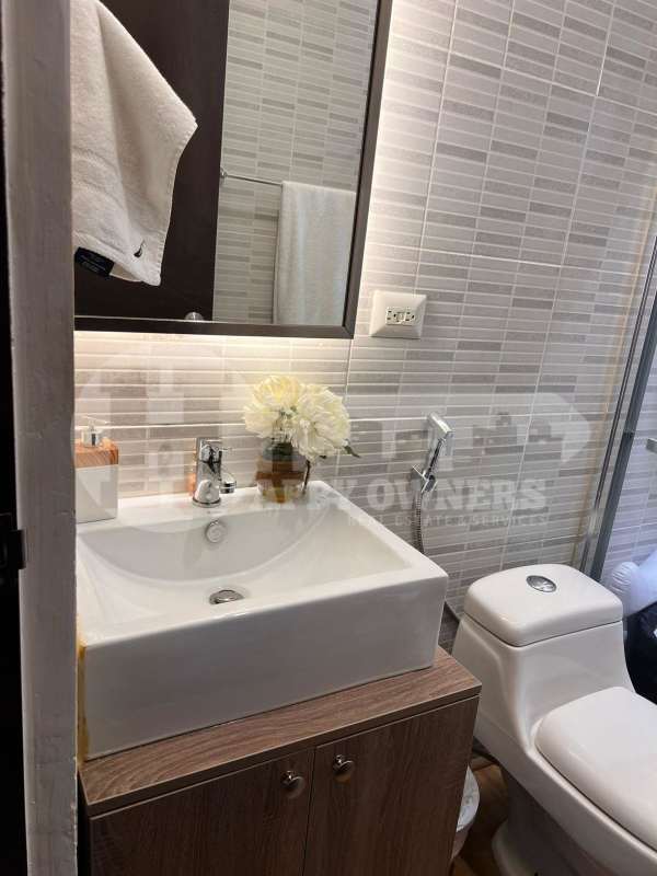 Spacious contemporary kitchen with granite countertops at PH Altamira Gardens Ancón Panama