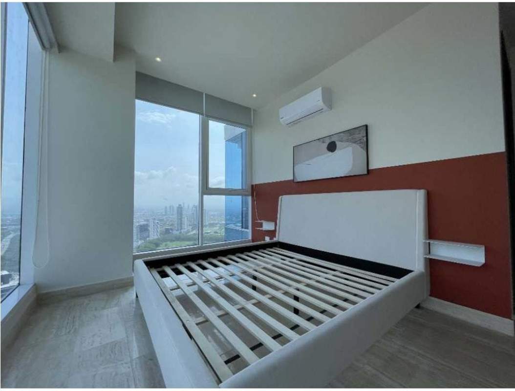 Multiple swimming pools with sun deck and landscaping at PH The Regent luxury condos Costa del Este Panama.