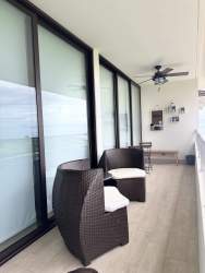 Terrace balcony with seating ocean view at Casamar Resort condo Panama beach rental