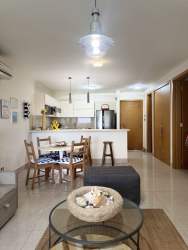 Bright living and dining with kitchen in Casamar beachfront condo San Carlos Panama