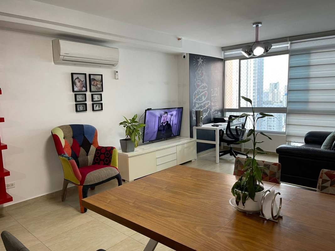 Open plan living and dining area with large windows city view PH Vista Park Carrasquilla Panama