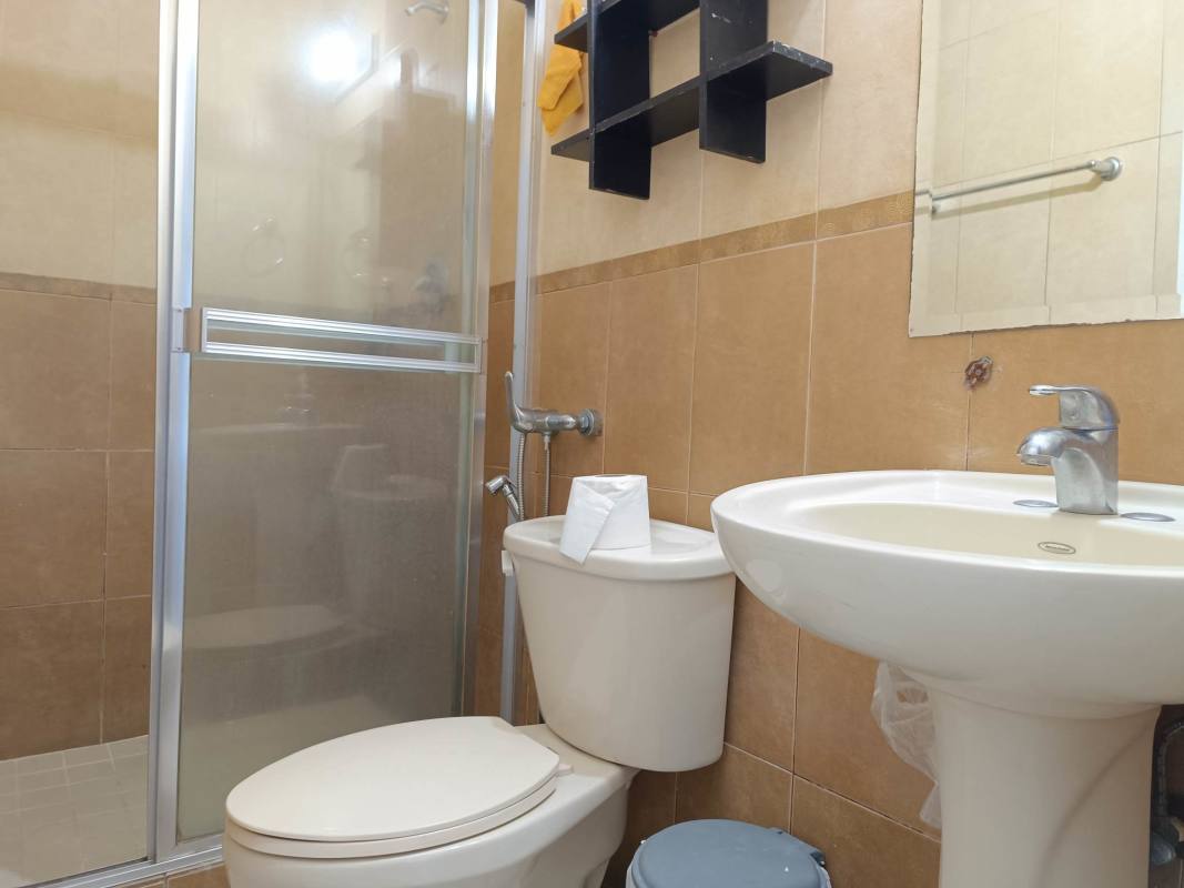 Bathroom with glass-enclosed shower, modern fixtures at PH San Francisco Bay Panama City