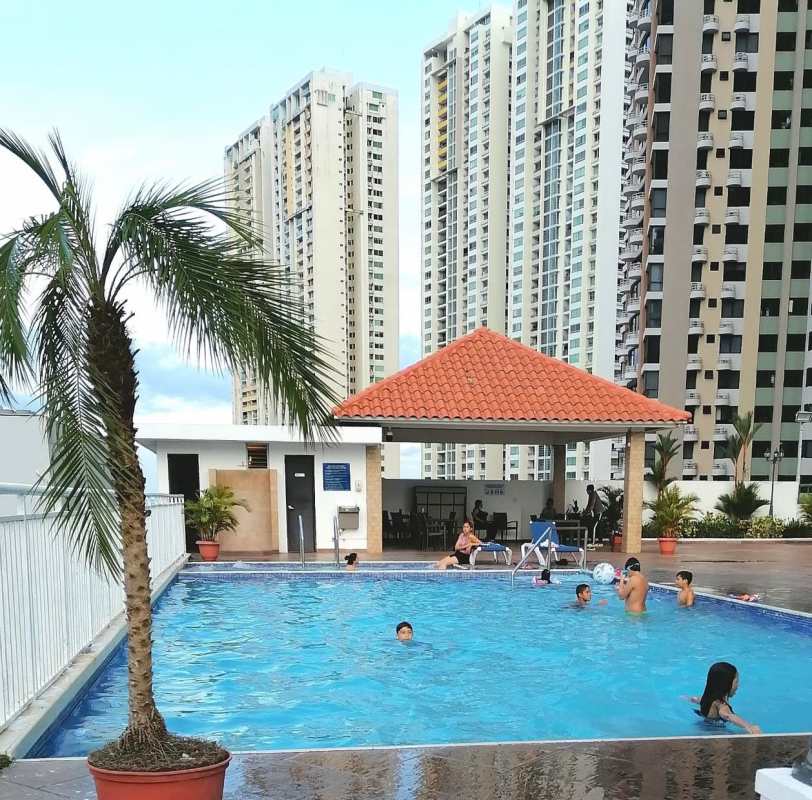 Swimming pool, kids play area, seating zone, skyline view from PH San Francisco Bay Panama City