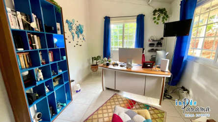 Bright kitchen with granite countertops, traditional cabinets and mountain view window Los Llanitos Panama