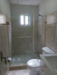 Living room with sliding doors to terrace in PH Residencias Limón