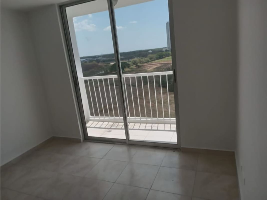 Bedroom with built-in closet space and ceramic tile flooring in PH Mystic Blue, Panama City