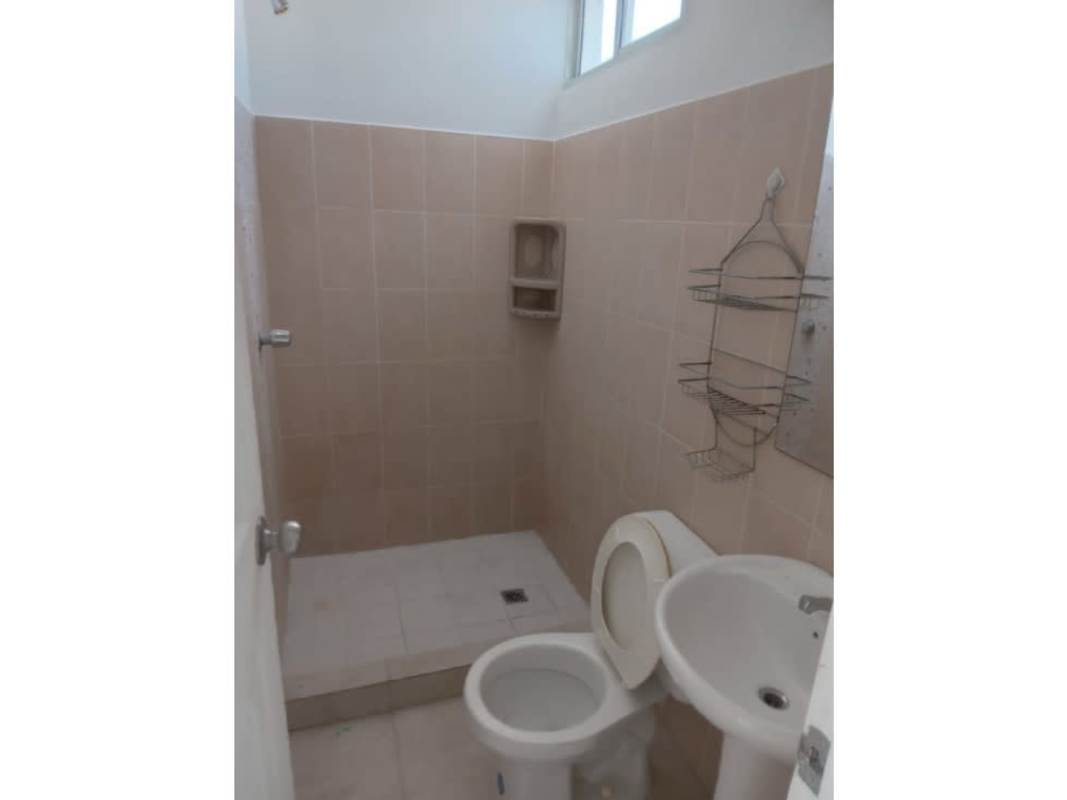 Compact bathroom with pedestal sink walk-in shower ceramic tiles PH Mystic Blue Juan Díaz Panama