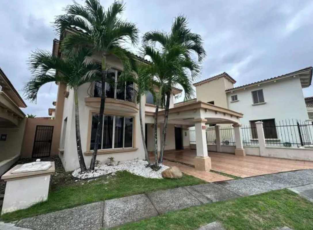 Modern walk-in closet with white cabinetry, drawers and hanging space Paseo Dorado Ancón Panama City