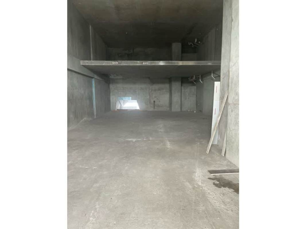 Empty raw warehouse-style commercial unit concrete finish PH Towers Business Center Obarrio