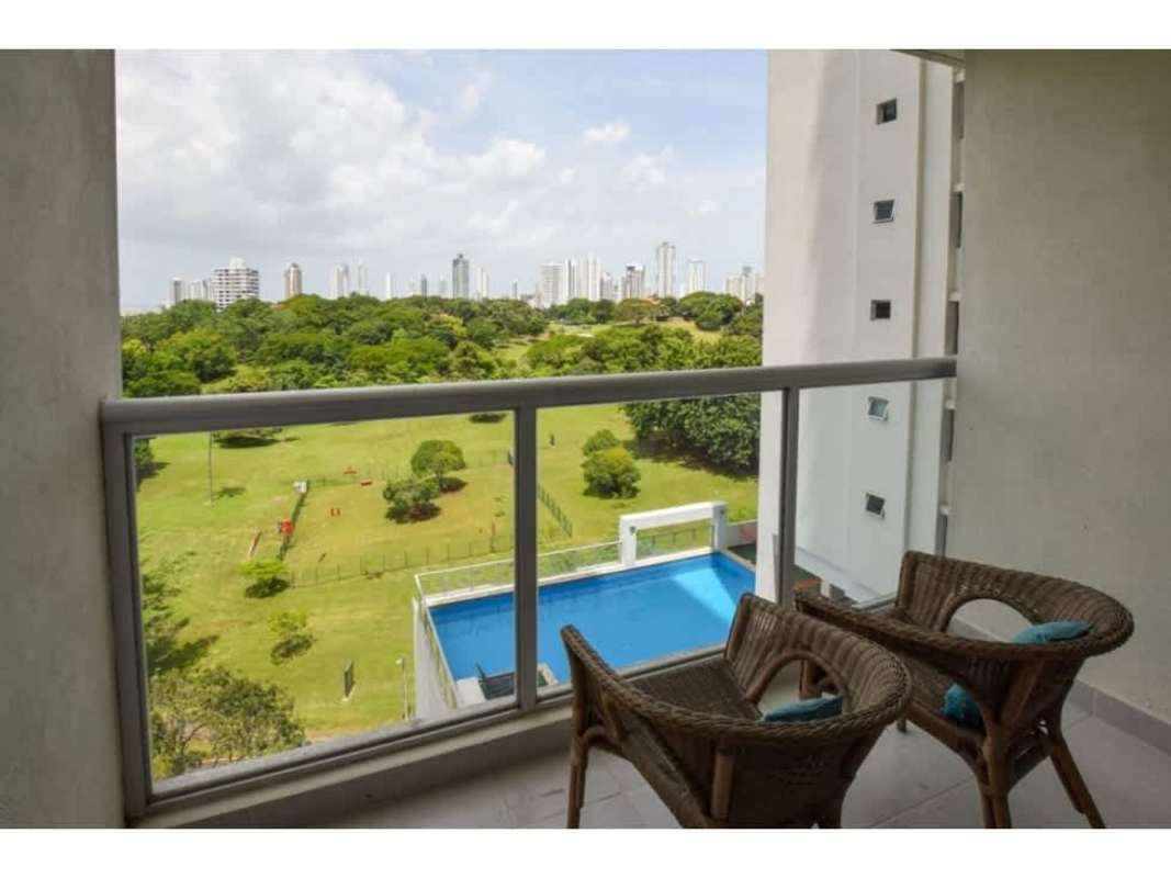 Balcony with glass railing enjoying panoramic skyline and park views in PH Residencias del Sol Panama City
