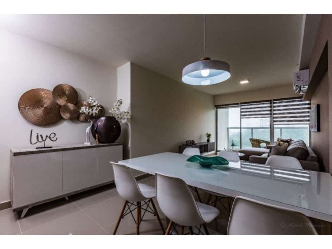 Master bedroom with en-suite bath, balcony access, and city view PH San Francisco Park Panama