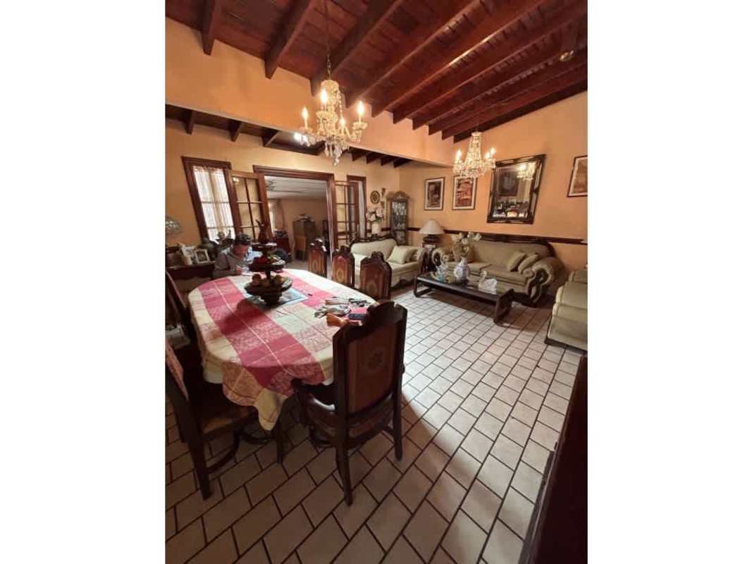 Covered rustic patio with tiled floor, garden furniture and fountain Chanis house for sale
