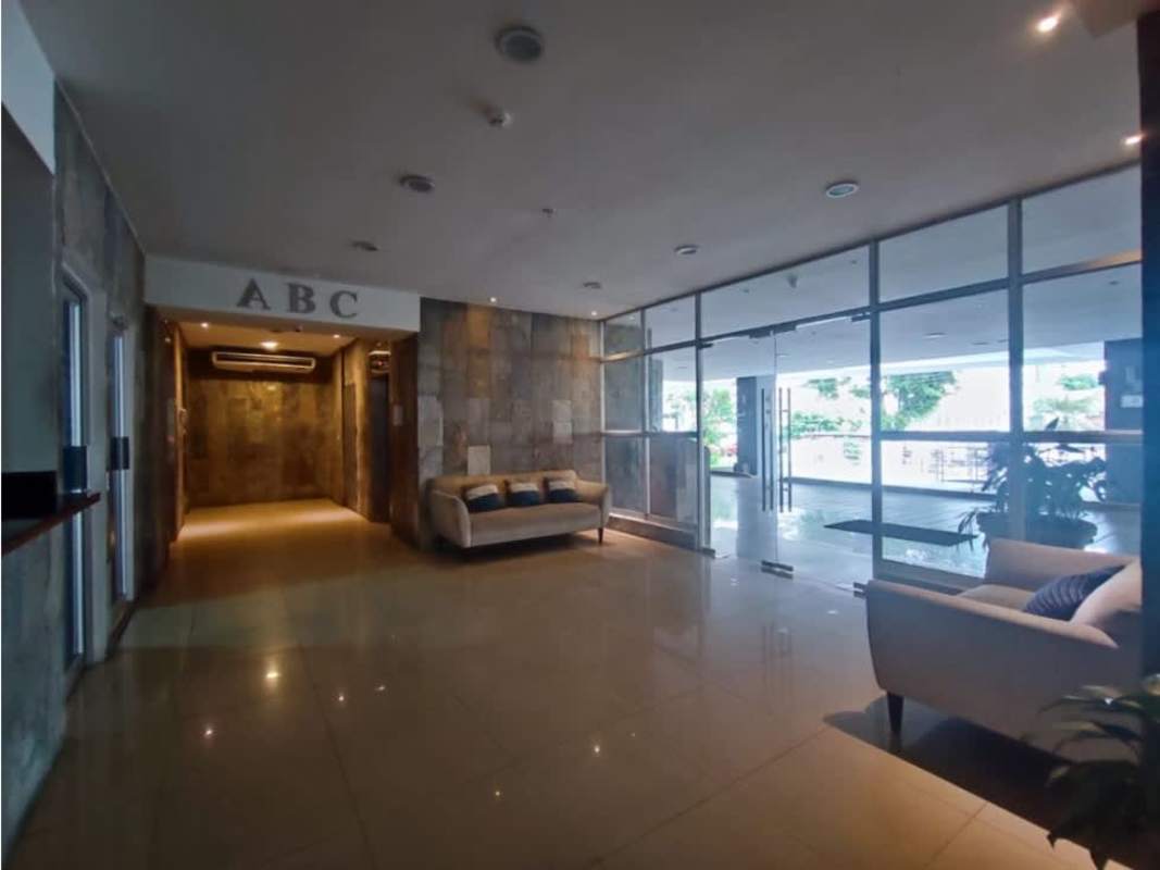 Kitchen with granite countertops, built-in appliances and tile backsplash in PH Infinity San Francisco Panama