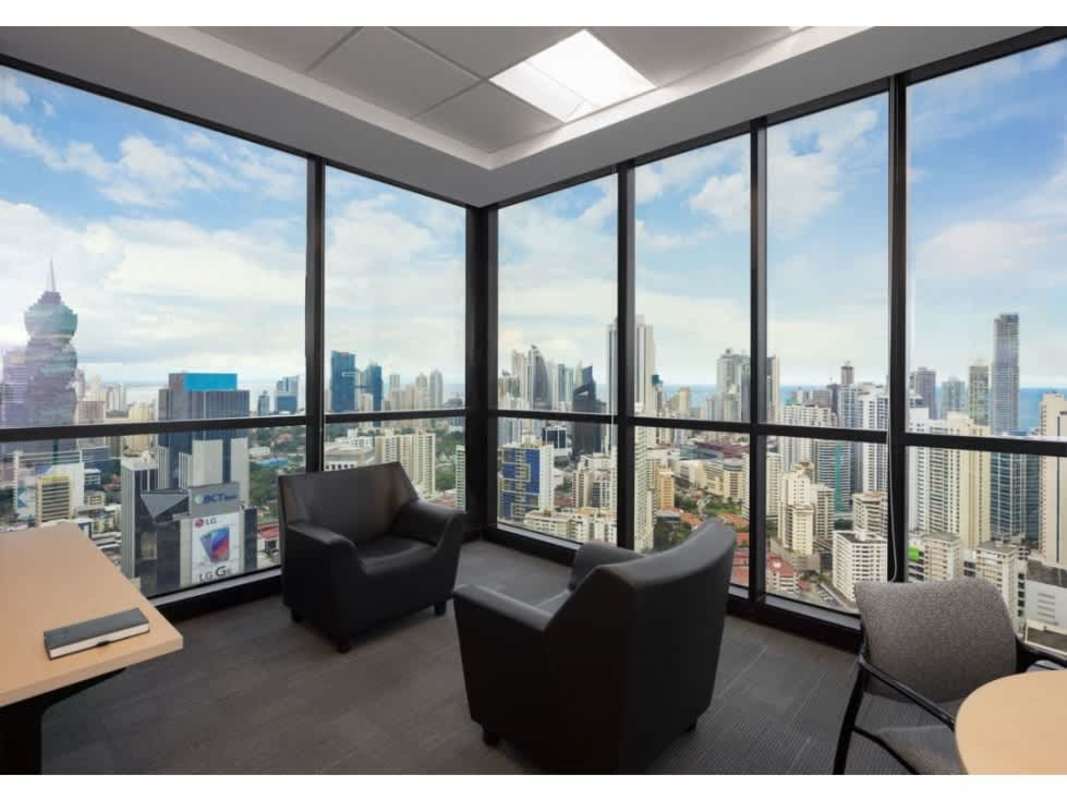 Modern marble lobby with reception desk and abstract art inside PH BICSA Financial District tower Panama