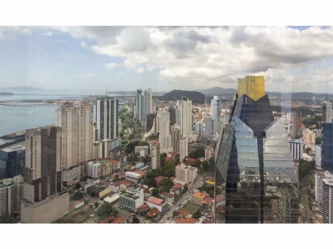 Luxury corporate office space with floor-to-ceiling windows overlooking Panama Bay in PH BICSA Tower Panama City