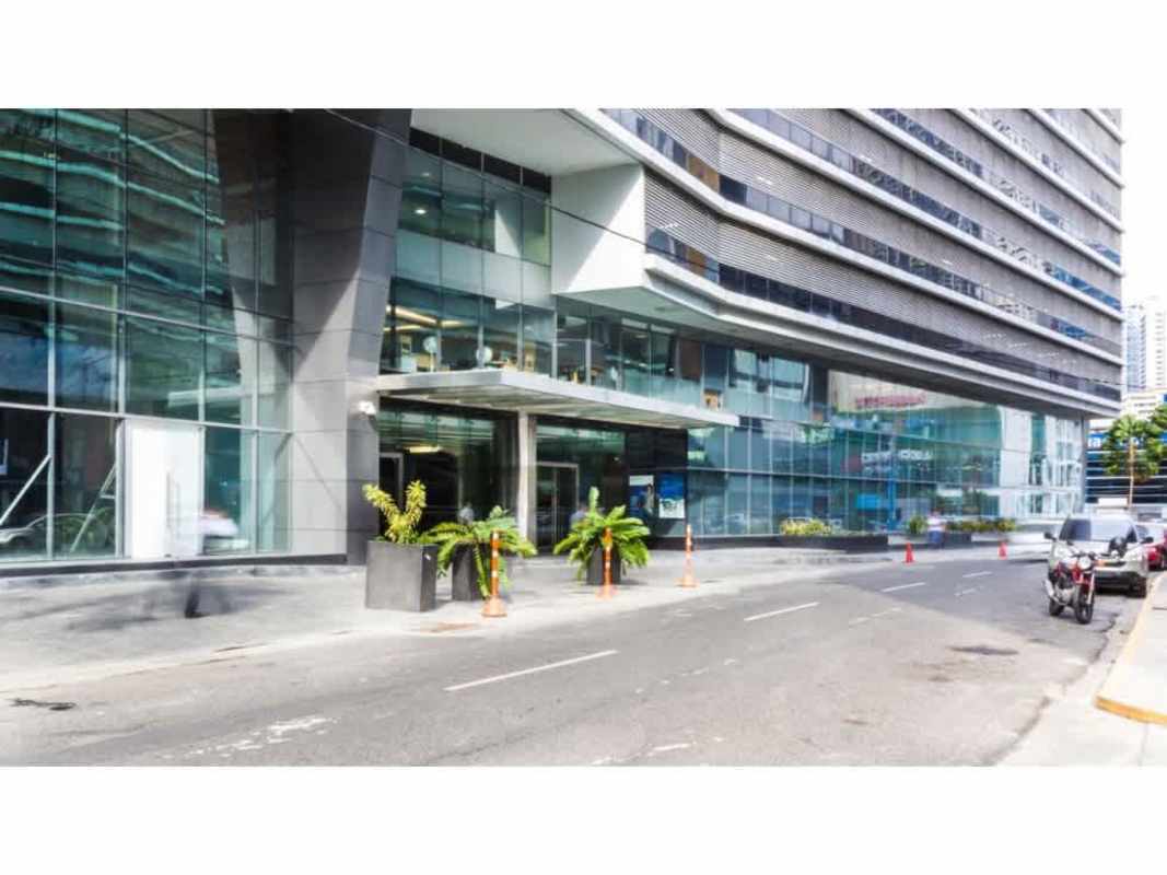 Tall modern skyscrapers including PH BICSA and ocean coast in Panama City's financial business district