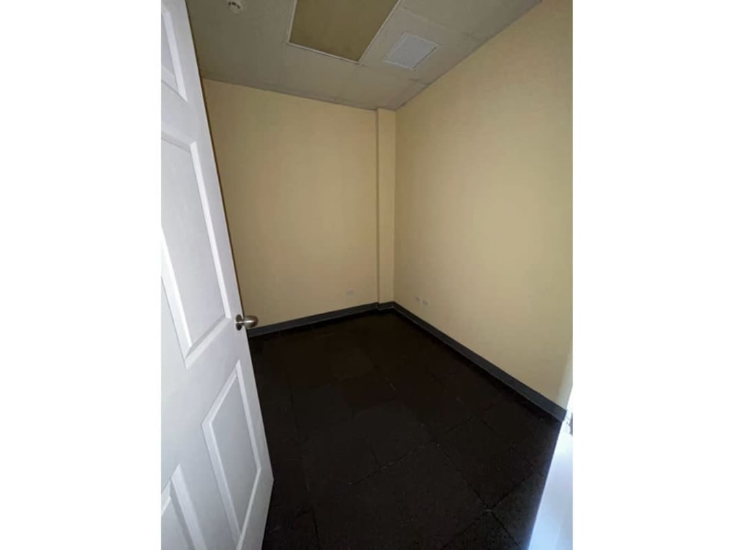 Unfurnished empty room commercial lease beige walls drop ceiling Panama