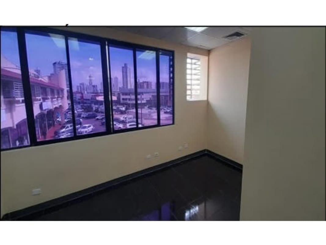 Empty office space featuring panoramic city view through large windows Panama