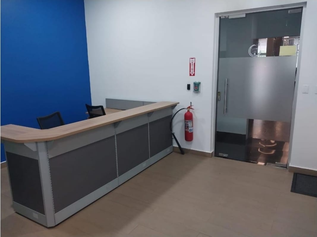 Reception desk and glass entrance lobby of office space at Global Business Terminal Panama City