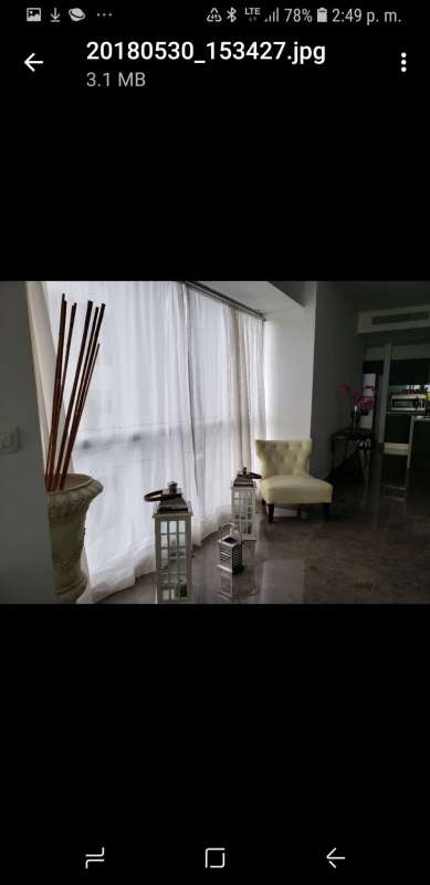 Modern bedroom featuring large windows, luxury bed and stunning views in PH Yoo Panama