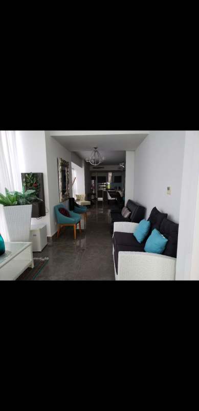 Bright living room corner with floor to ceiling windows and marble floors in PH Yoo Panama