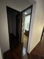 Bathroom featuring colorful patterned tiles in Altos del María mountain residence