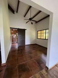 Spacious living and loft with natural light and exposed beams Altos del María