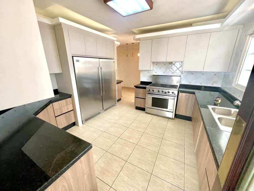 Private swimming pool with jacuzzi lush garden Costa del Este Santa María luxury home Panama