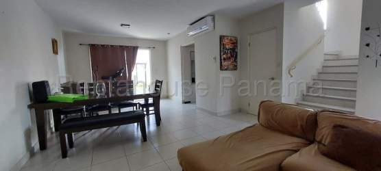 Master bedroom with balcony access and walk-in closet in Versalles Oeste La Chorrera