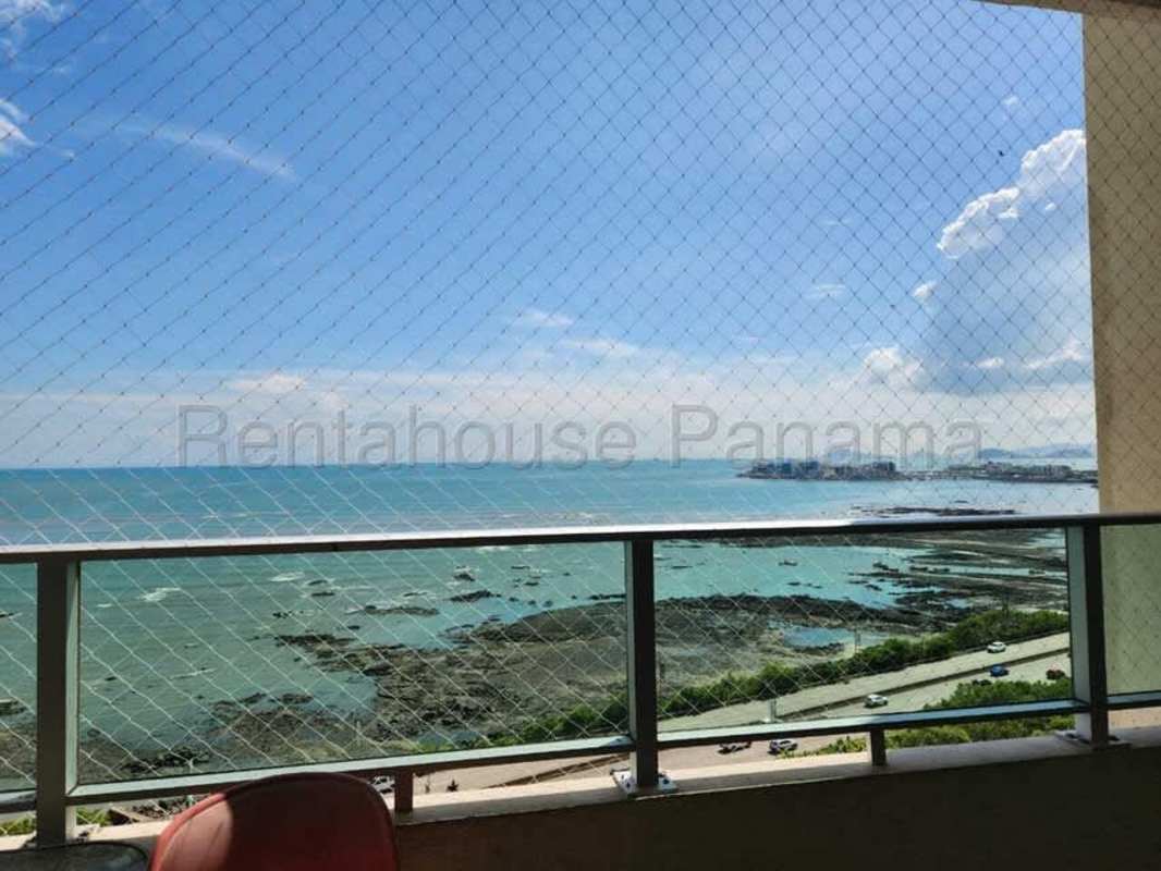 Spacious master bedroom featuring large windows with ocean views at PH Pacific Sea San Francisco