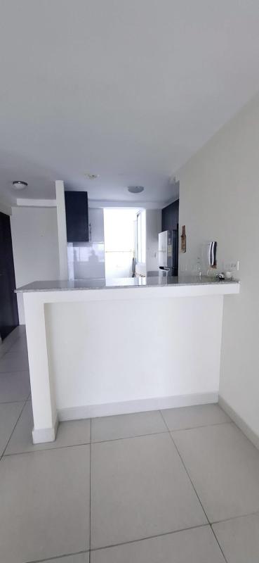 Kitchen with granite countertops and breakfast bar PH Arenas Park Parque Lefevre Panama