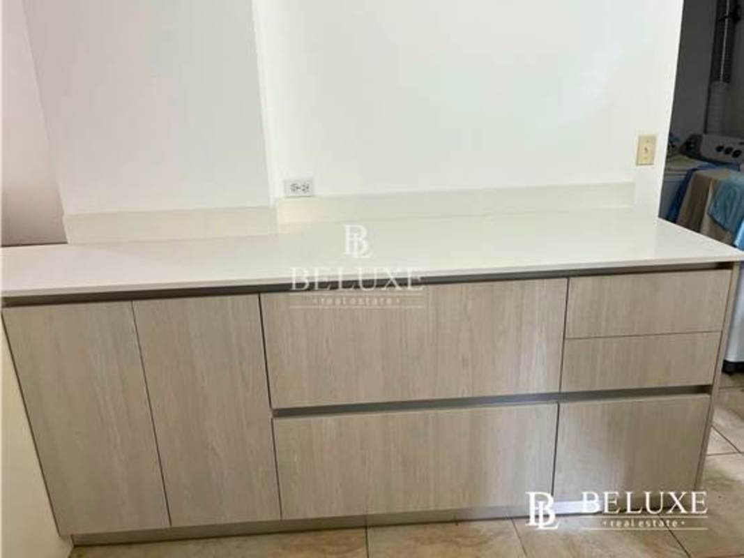 Contemporary bathroom featuring double sink vanity with stone countertop in PH Amador Hill Panama
