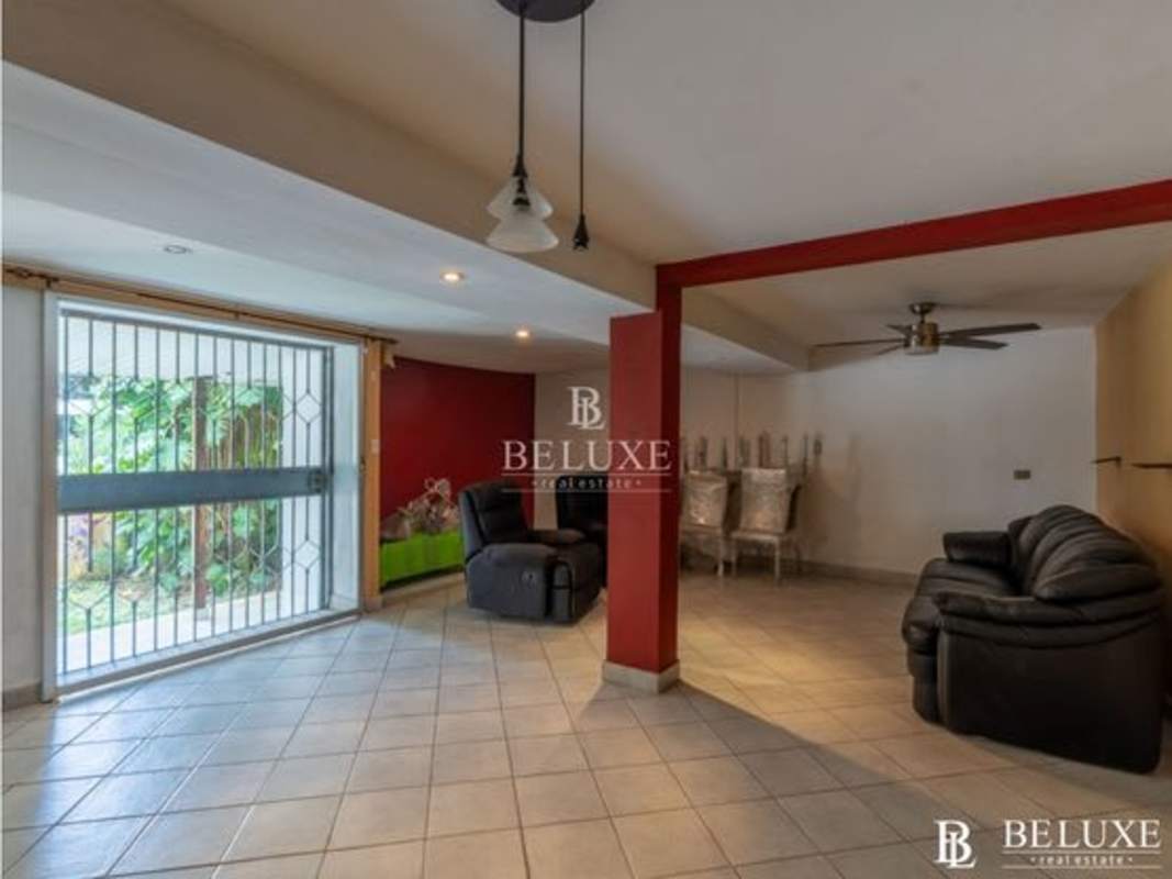 Large traditional kitchen with granite countertops in duplex house El Cangrejo Panama City