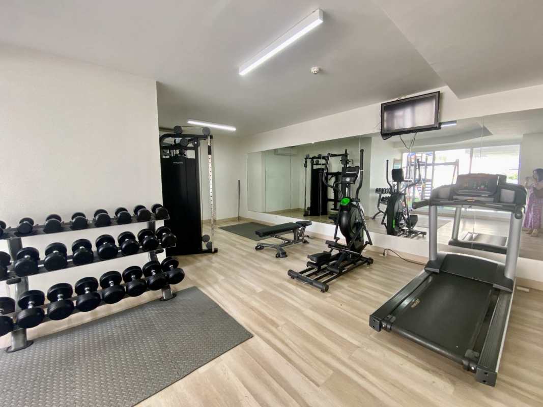 Gym with machines and city view in PH Galeria Uno Obarrio Panama