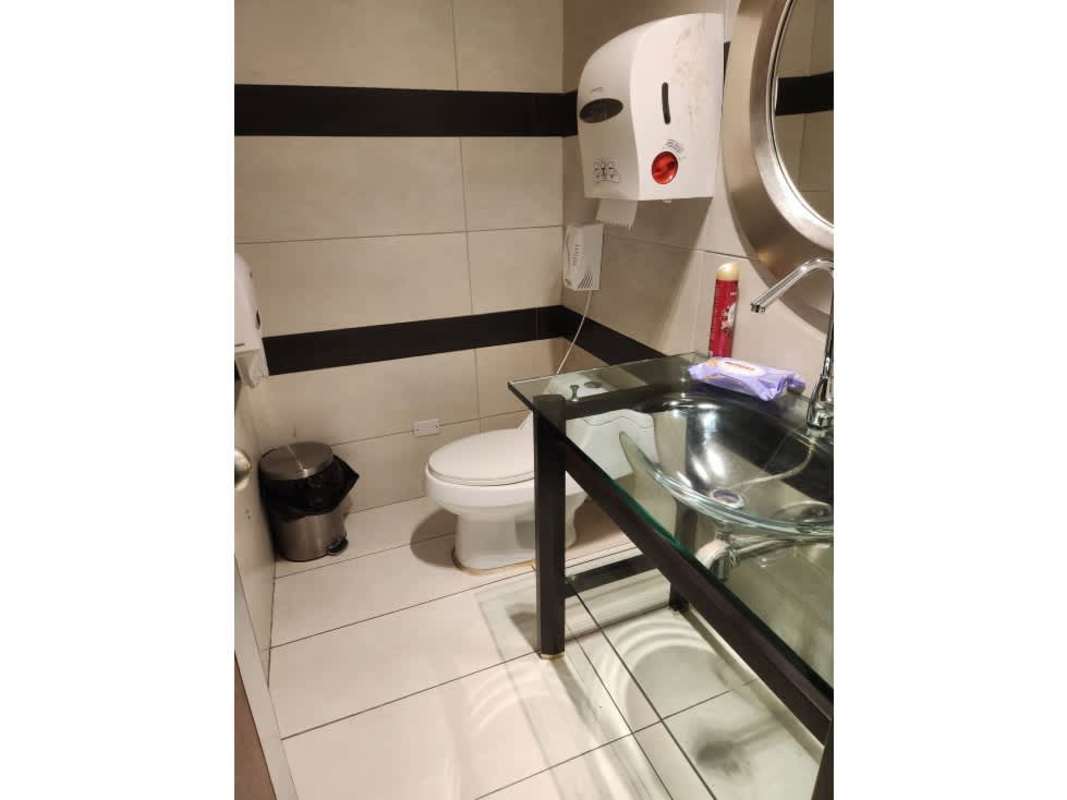 Children's playroom area with ball pit climbing wall swings in commercial property Panama City