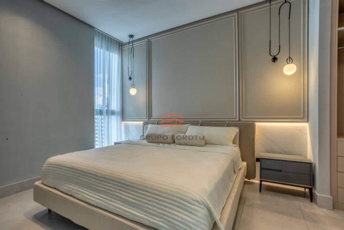 Minimalist bedroom with upholstered wall, panoramic window and sea views PH Paitilla Tower Panama