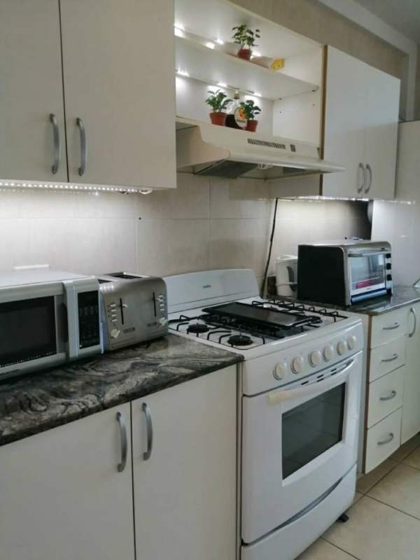 Contemporary kitchen with granite countertops and modern cabinetry at PH Cangrejo 507 El Cangrejo Panama