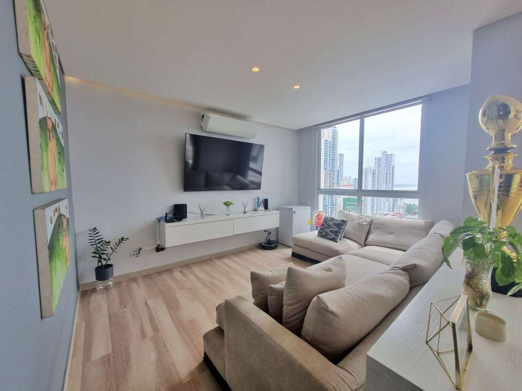 Spacious modern kitchen with island black countertop ocean view at PH Mandarin Bay Panama