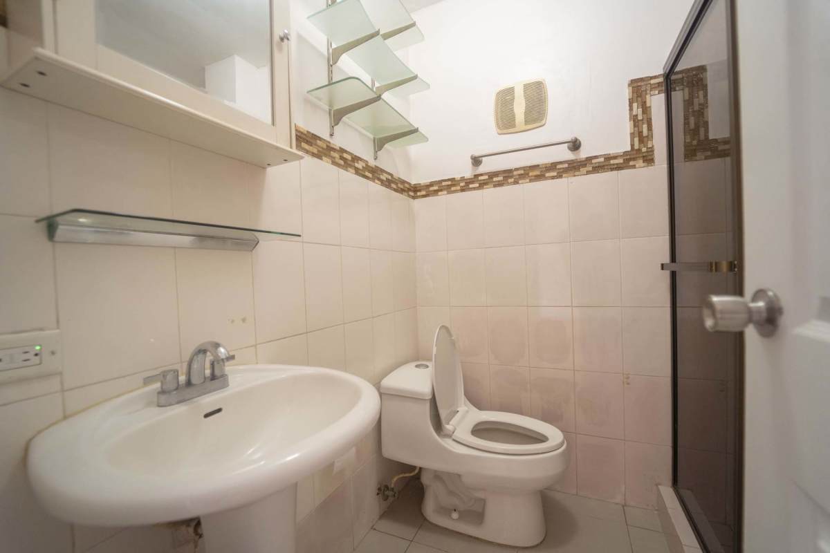 Contemporary bathroom with pedestal sink, glass shower ph vista del golf panama